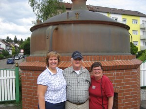 Kimberly with Herb and Sue Hausmann in front of the Brauhaus brewery