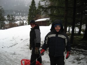 Even in the rain, the boys enjoyed some serious sled riding fun!