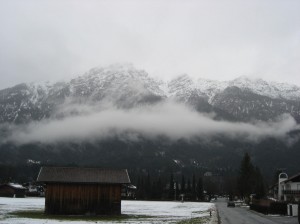 The Alps seem to soar above the clouds on a cold, foggy morning