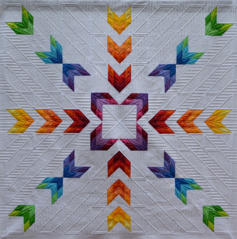 Designed and sewn by Kimberly Einmo. Exquisitely machine quilted by Judi Madsen, Green Fairy Quilts